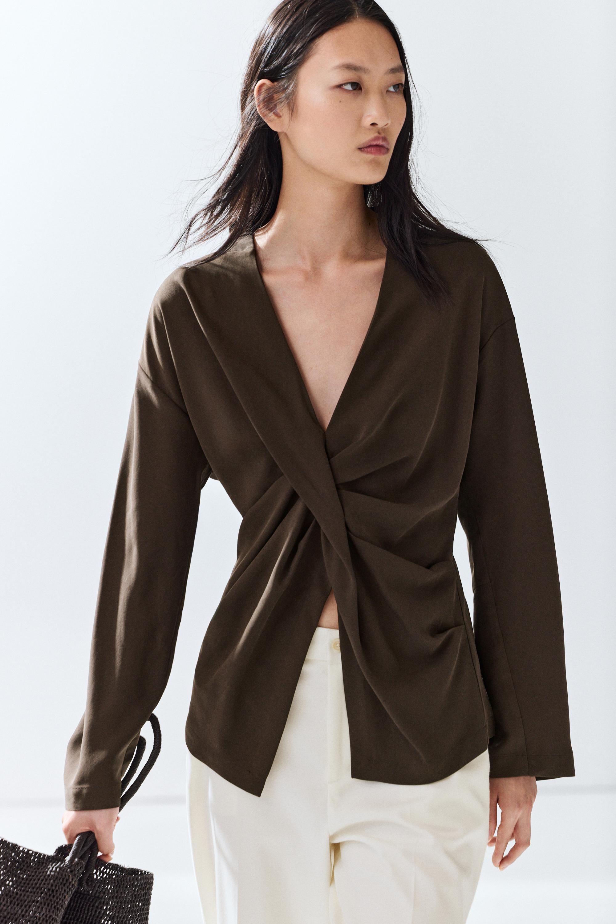 Flowing blouse with draped detail